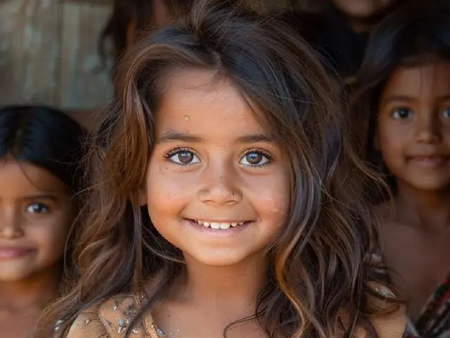 A smiling girl from a Kolkata community