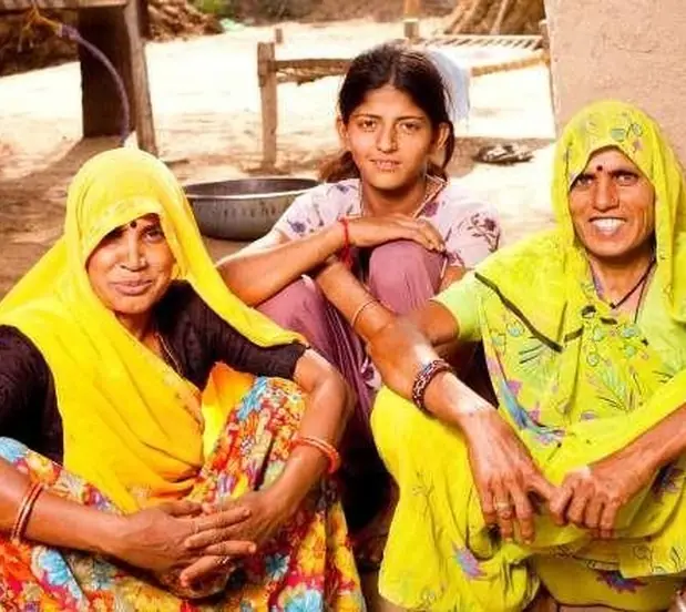Women volunteers sitting together